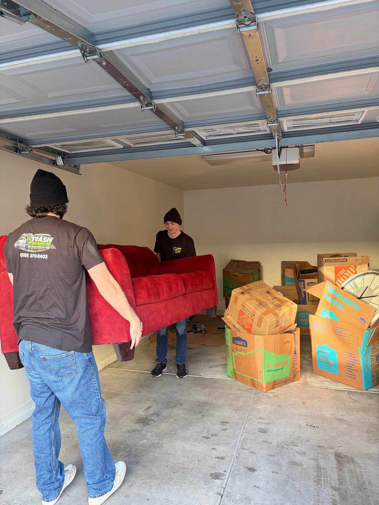 Junk removal truck loaded with furniture and junk in Fresno California
